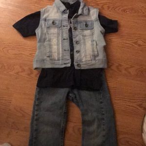 Wrangler jeans/DKNY vest/ and wrangler tee